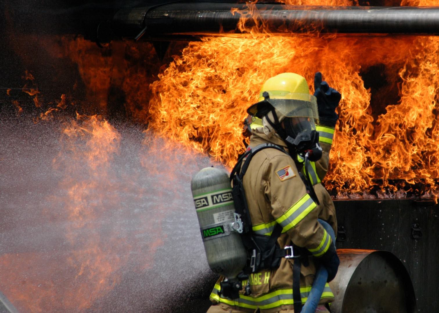 First responders working a live fire during a joint training exercise
