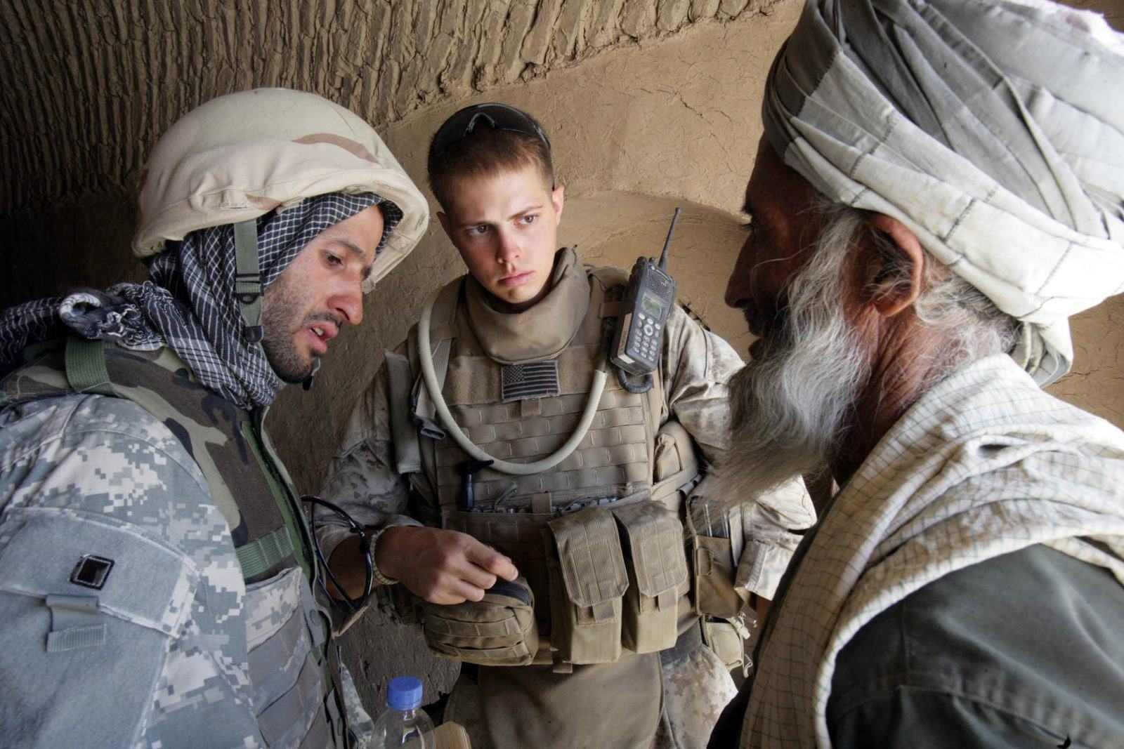 A Navy corpsman providing care during a community mission