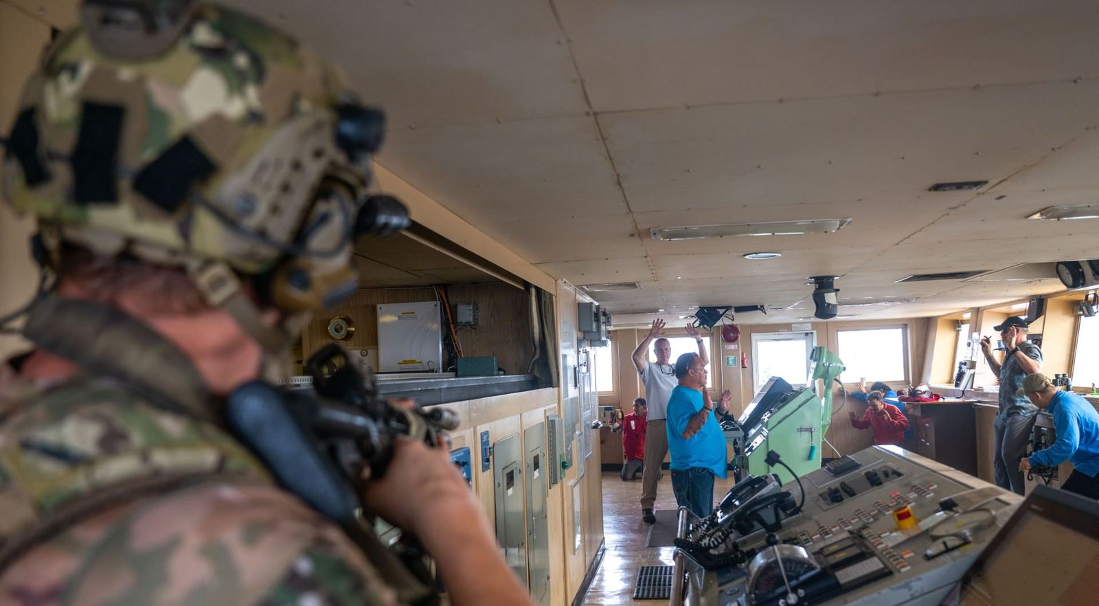 Operators moving through a structure during a clearance exercise