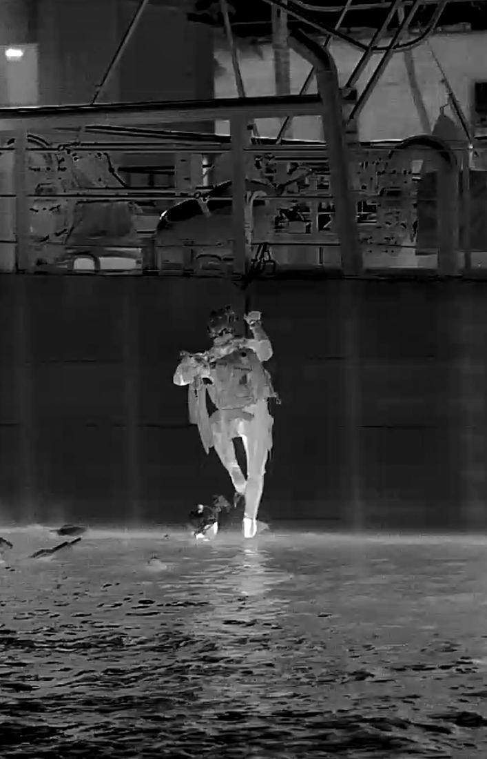 An operator coming out of the water during a boarding exercise